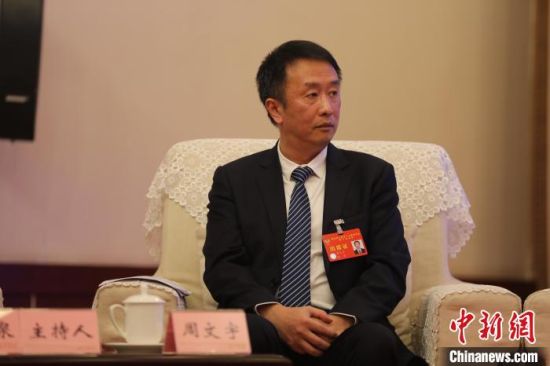 四川省政协常委,民革四川省委会副主委周文宇。金冠池摄 四川省政协常委,民革四川省委会副主委周文宇。金冠池摄