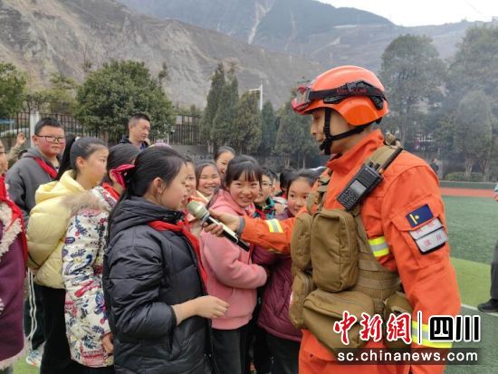 宣传月活动现场。汶川县委宣传部供图 宣传月活动现场。汶川县委宣传部供图